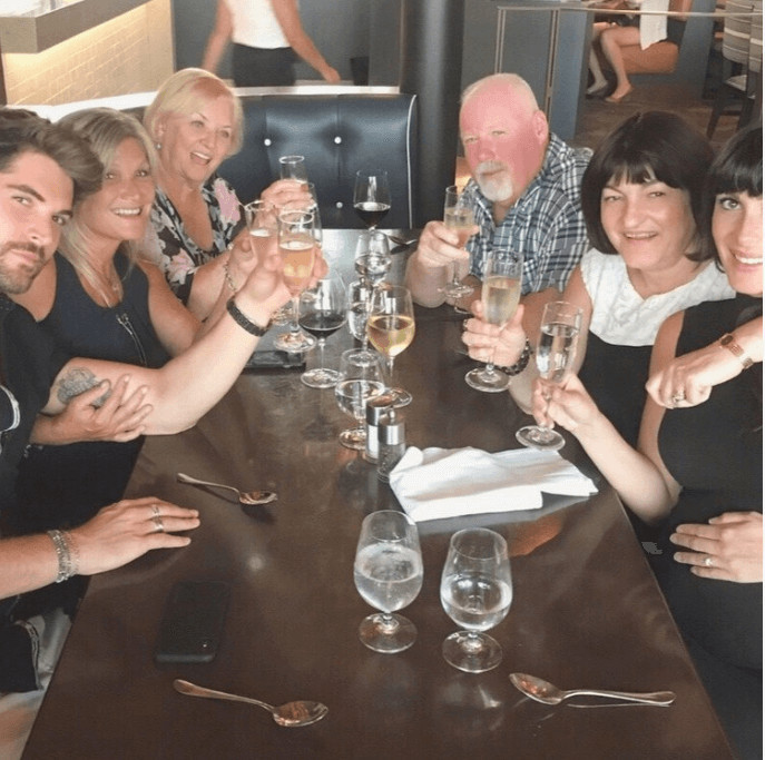Nick with his then Fiancé Maria and their family, celebrating their engagement